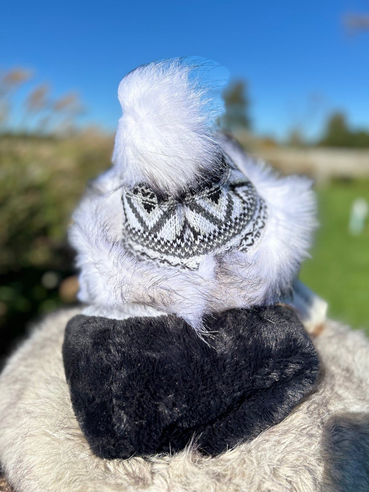 White Hat with Intricate Weave and Faux Fur