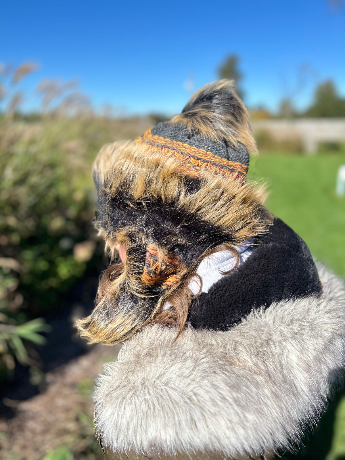 Tawny Hat with Intricate Weave and Faux Fur
