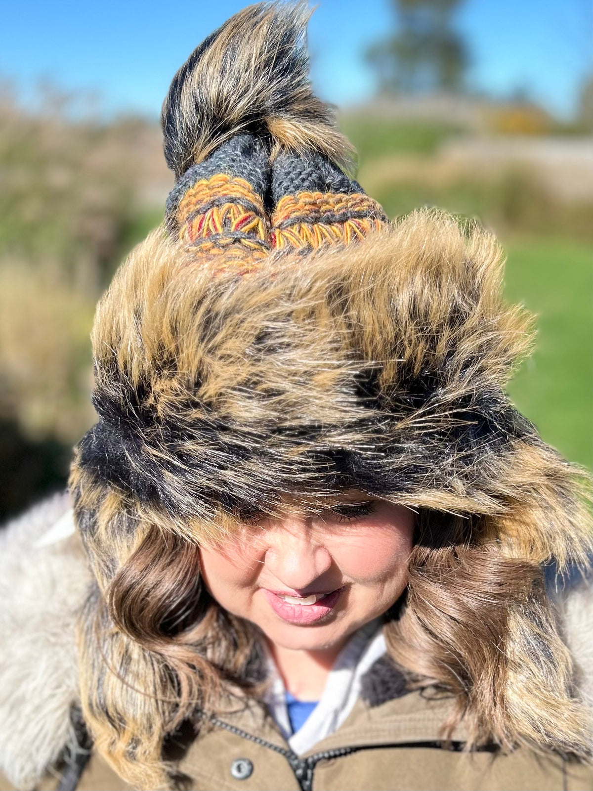 Tawny Hat with Intricate Weave and Faux Fur