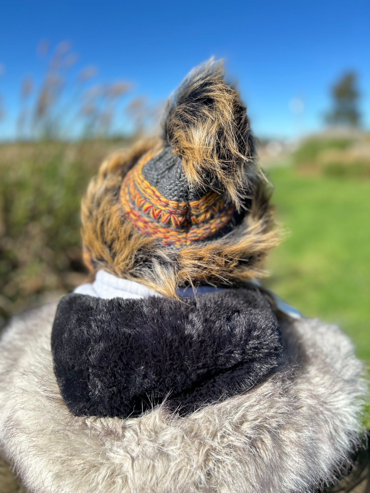 Tawny Hat with Intricate Weave and Faux Fur