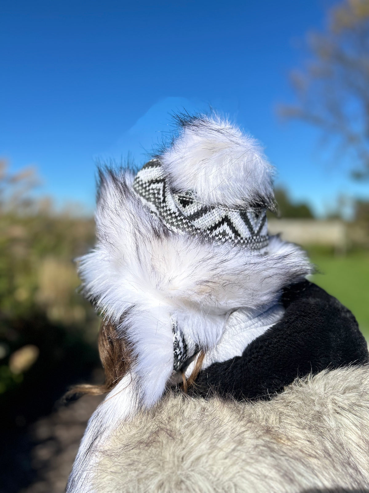 White Hat with Intricate Weave and Faux Fur