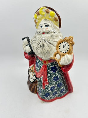 Figurine with clock