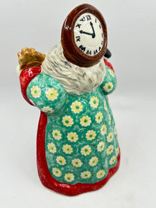 Figurine with clock