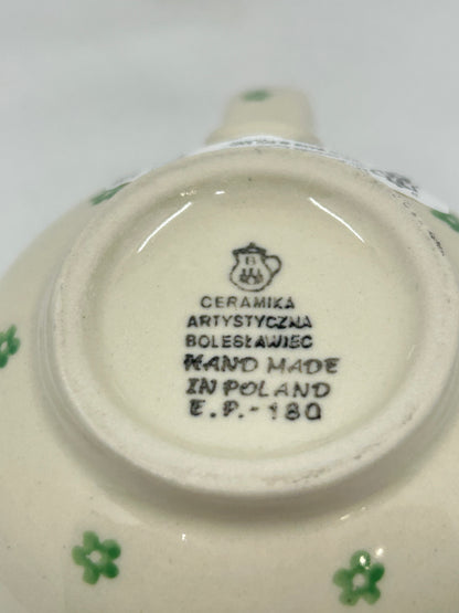 Bottom base of a Ceramika Artystyczna Polish pottery bubble mug showing the official factory logo and Hand Made in Poland stamp.