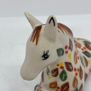 Sitting Horse - Green and Brown Leaves with Red Dot