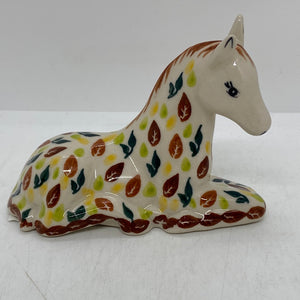 Sitting Horse - Green and Brown Leaves