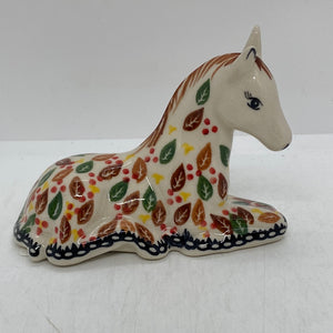 Sitting Horse - Green and Brown Leaves with Red Dot