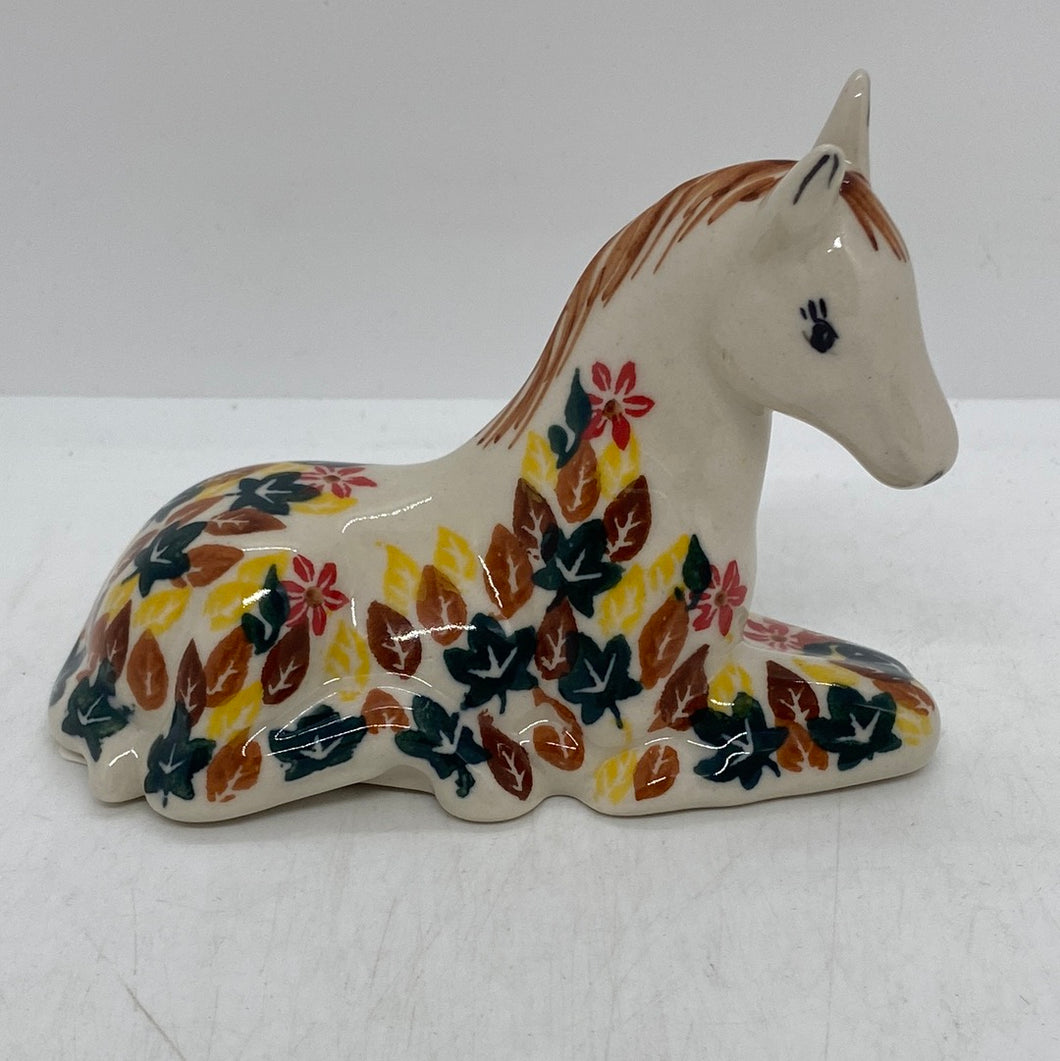 Sitting Horse - Green and Brown Leaves with Red Flower